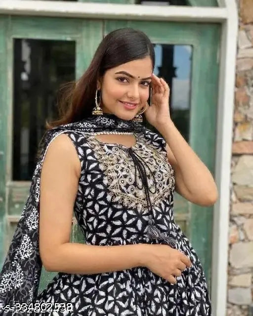 Black rayon kurta set with dupatta and bottomwear, three-quarter sleeves, printed design on display