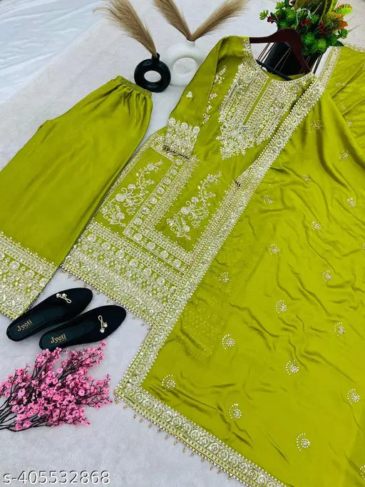 Green embroidered kurta with matching accessories