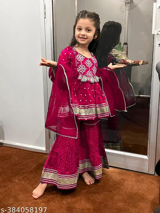 Red kids pom pom sharara set, rayon top and bottom with organza dupatta, embroidered, three-quarter sleeves, pack of 3 sizes: 3-4 yrs, 5-6 yrs, 7-8 yrs, 9-10 yrs, 11-12 yrs, Indian origin