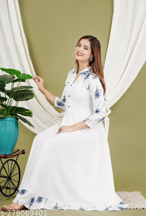 White Anarkali kurti, rayon fabric, three-quarter sleeves. Traditional Indian women's dress for casual or office wear, ideal for special occasions. Made by Sapna kUrti in India