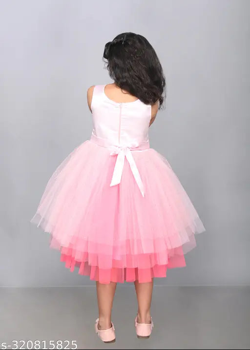 Baby pink layered knee length girls party dress, net fabric with sleeveless design, India origin