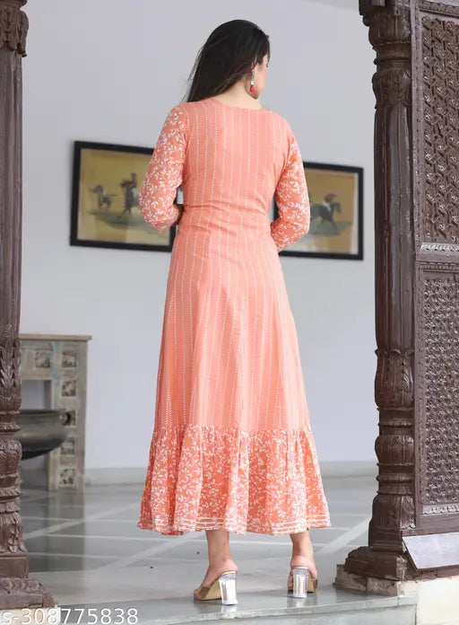Peach rayon floral embroidered Anarkali Kurta by Kushi Design, three-quarter sleeves, indigo, red, pink, orange, yellow sequins and beads detailing on India-made ethnic wear