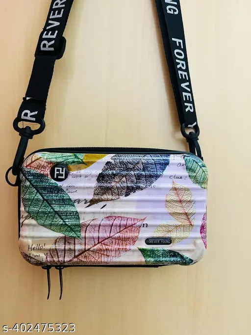 Floral PVC slingbag, premium attractive design for women and girls. Free size (L: 7in, W: 4in, H: 3in), originating from India