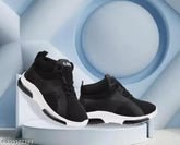 Black EVA sole casual running shoes for boys, ideal for sports. Lace-up fastening with printed net pattern, suitable for kids aged 4-5 years to 11-12 years. Made in India