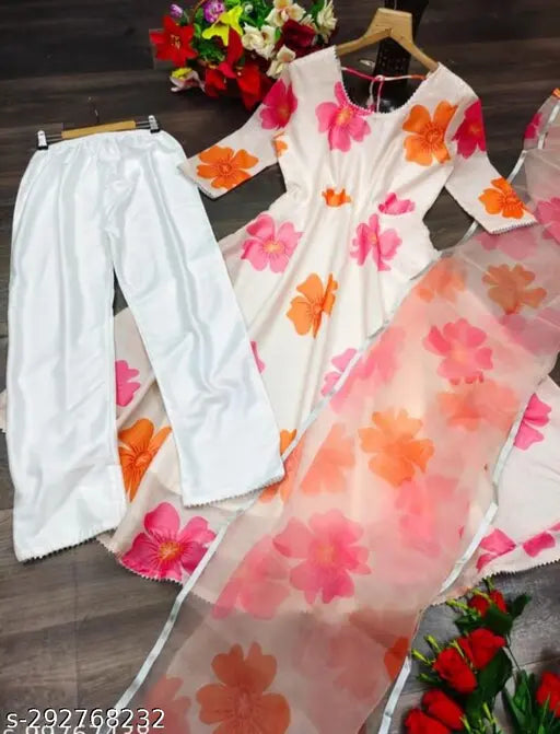 Floral printed georgette kurta set with cotton blend pants and dupatta, three-quarter sleeves, round neck. Indian-made fashion for all seasons