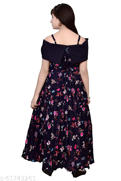 Blue poly silk ethnic gown for girls, printed net style, sleeveless design. Beautiful dress from Ajiza Garments, suitable for ages 4-12 years old. Made in India
