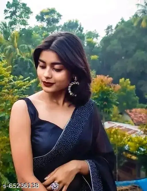 Whiteblack zebra stripe poly georgette saree with separate art silk blouse, Indian fashion accessory on display