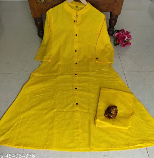 Women's cotton kurta Katha set with matching pants, solid-colored traditional Indian ethnic wear on display rack