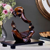 Handcrafted resin Ganesha idol for home decor, 15.5cm L x 21cm H x 10.5cm B, India origin. Elegant statue of Lord Ganesha for living room or gift