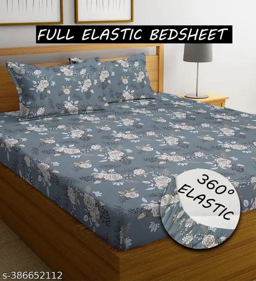 Blue striped elastic cotton double bedsheet set with 2 pillow covers (78x72+10, 28x18), ideal for AC rooms and heavy mattresses. Superfine floral-patterned bedding set for adults, machine washable in cold water