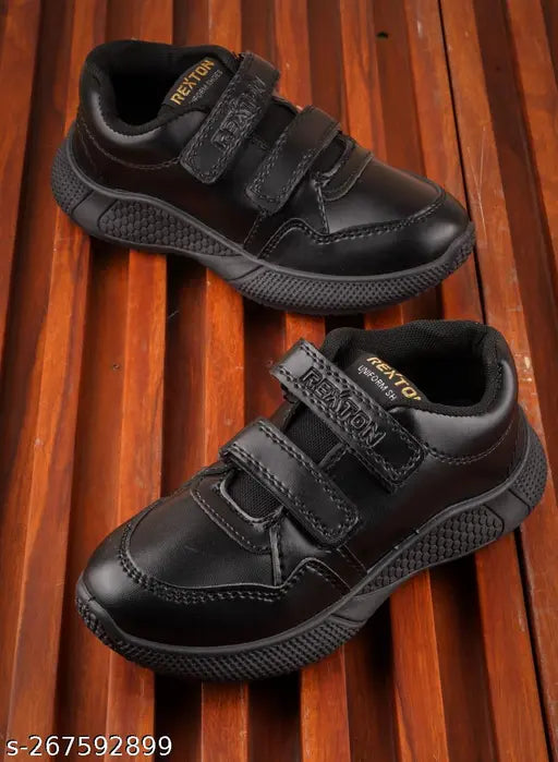 Boys synthetic leather school uniform dress shoes, black or white, buckle fastening, ideal for ages 2-12 years