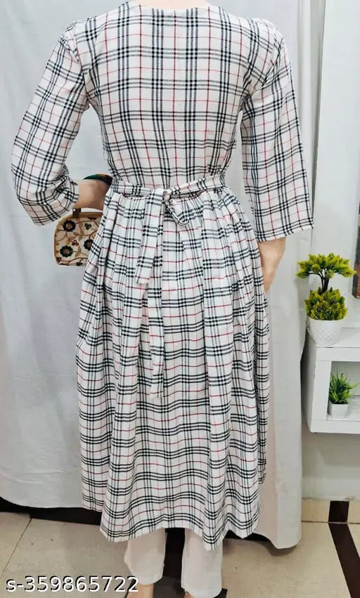 White woolen frock kurti for winter, checked design with three-quarter sleeves. Casual to formal wear, made from soft 100% woolen fabric. Fit type: regular, length: 44". Available sizes: L, XL, XXL, XXXL, 4XL (Bust sizes provided). Indian origin