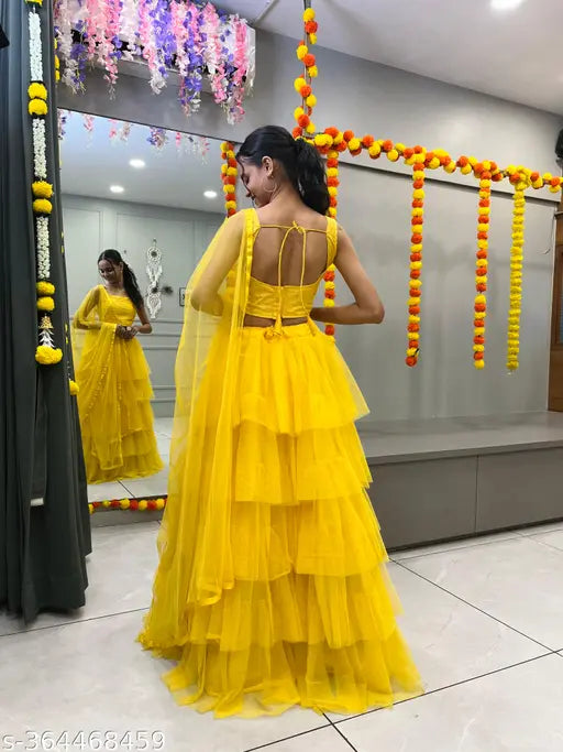 Red net lehenga with choli and dupatta, solid embroidery work, semi-stitched (39in waist, 41in length), ready for Indian celebrity daily wear or party events