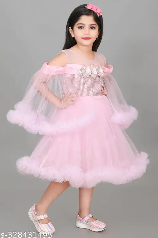 Pink net hanging sleeve knee-length dress for girls, embellished with intricate patterns. Lightweight and perfect for special occasions
