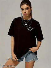 Black oversized cotton printed t-shirt on hanger, popular style for women and girls, featuring long sleeves and size options from XXS to XXL