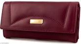 Maroon faux-leather clutch purse with magnetic closure, 5 compartments, zipper pockets, and trending design