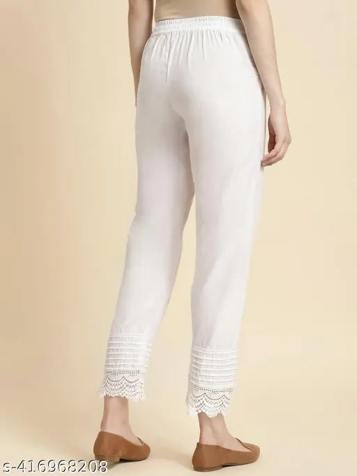 Solid white cotton trousers by Rangita for women, available in S-XXL