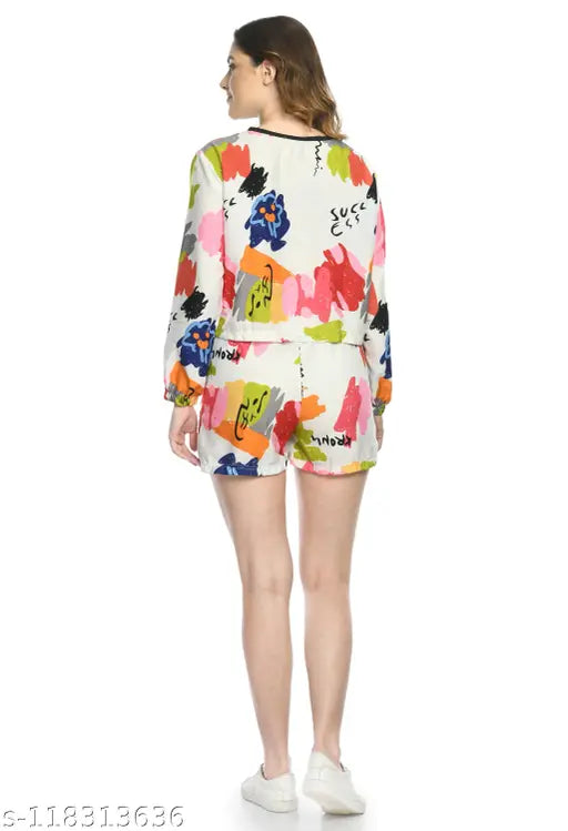 Pink and white retro-style women's top & bottom set, polyester fabric, long sleeves, round neck, abstract print shorts with slip on closures. Comfortable nightwear from fashion hub, India