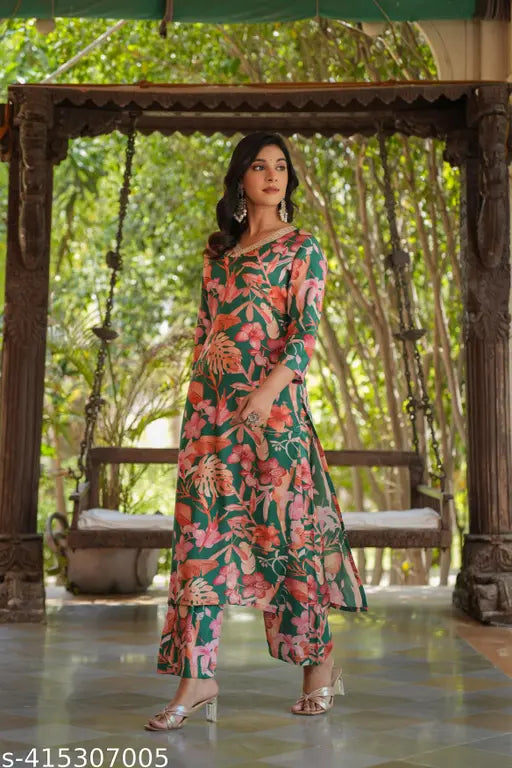 Green cotton blend printed straight kurta with palazzos, three-quarter sleeves, and pant - Indian traditional outfit for women