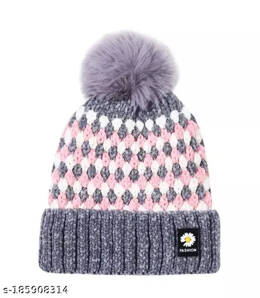 Assorted color women's woolen beanie hat with faux fur pom pom. Thick, dual-layered, and ultra-warm for winter