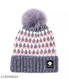 Assorted color women's woolen beanie hat with faux fur pom pom. Thick, dual-layered, and ultra-warm for winter