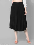 Black crepe pleated midi skirt, travel-friendly and flattering for all body types