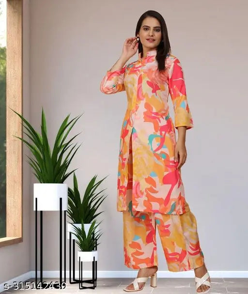 Cream peach rayon co-ord set with three-quarter sleeves, printed pattern, and mandarin collar. Multi-colored set with pockets in plazzo, perfect for various occasions. Rayon material ensures trendy and stylish design. Sizes: S, M, L, XL, XXL. India origin
