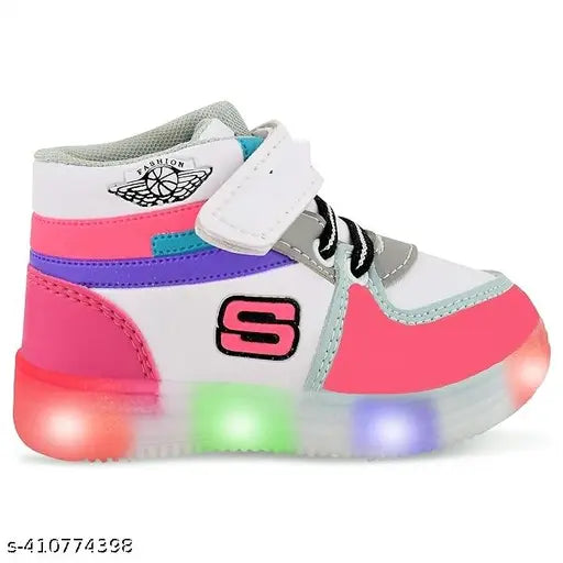 Baby pink synthetic LED light shoes for kids (ages 0-5), made from high-quality breathable cotton blend material. Features adjustable Velcro closure, comfortable sole, and unique LED light design that lights up with each step. Ideal for night outings, partywear, and exploration. Comfortable shoes for boys and girls