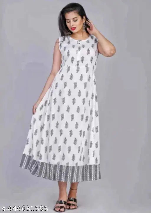 Black rayon kurta with attached jacket, three-quarter sleeves, gold print, round neck, tassel detail - Trendy Drishya Kurtis, size M to XL, made in India