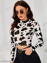 Printed black and white lycra full sleeve T-shirt with cow print, featuring sheer long sleeves in a slim fit, suitable for casual style