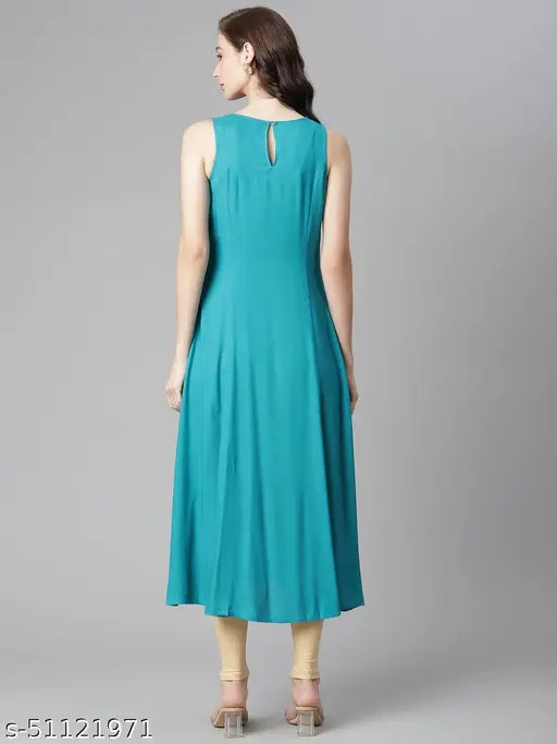 Torquoise viscose rayon sleeveless A-line kurti with boat neck, yoke embroidery, side zipper, calf length, and flared hem. Made in India." (125 characters)