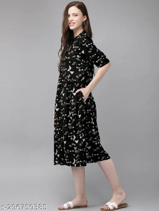 Black rayon flared kurti with three-quarter sleeves, printed ethnic design for women