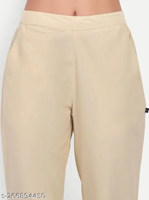Cotton beige pants with elasticated waistband, two pockets, sizes ranging from S to XXL, origin India