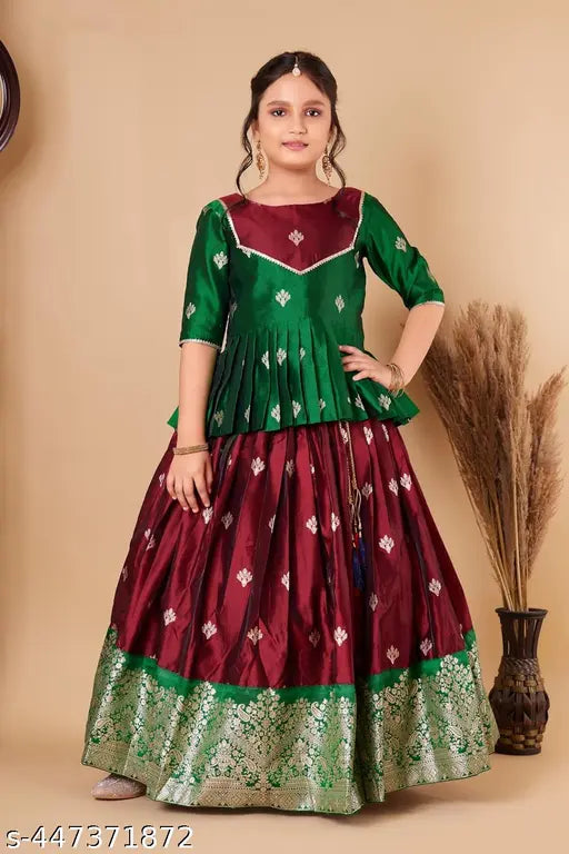 Cotton silk Lehanga Choli set for kids, zari woven top & stitched net with short sleeves, available in various sizes from 12-12 years. Indian origin