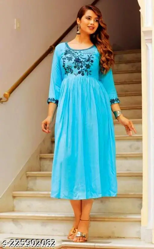 Rayon three-quarter sleeve blouse, embroidered combo in G M BLUE on display
