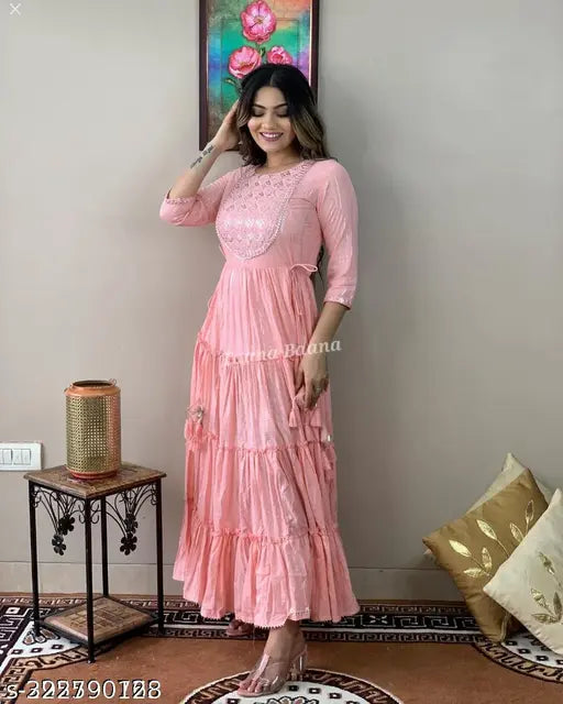 Pink rayon embroidered gown, solid design with three-quarter sleeves. Rayon dupatta in dupion silk, India origin