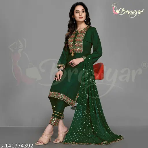 Green rayon kurta set with embroidered mirror work and dupatta, featuring pants with border embroidery. Indian-made, heavy cotton & rayon blend