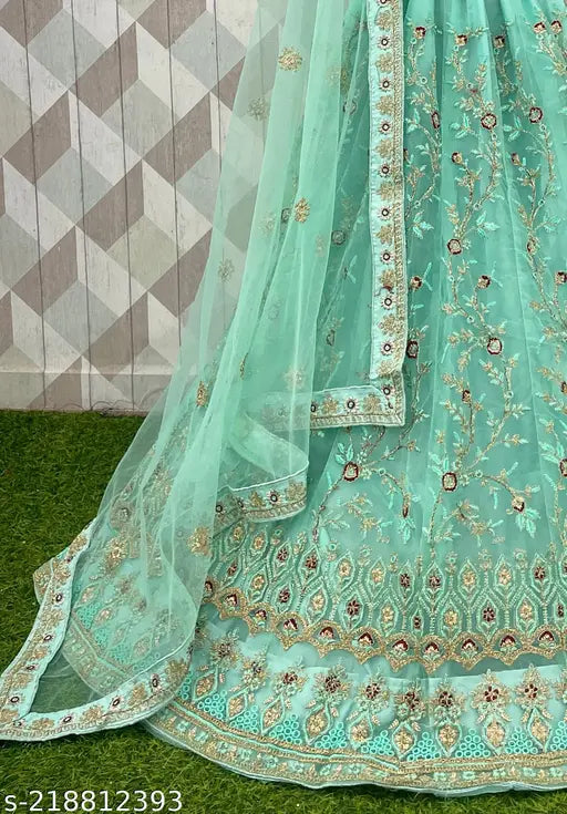 Sea green embroidered Zari work Lehenga Choli and Dupatta set, made of net fabric for women. Exquisite detailing, free size with 2.5m dupatta length. Perfect for normal occasions, get-togethers, and casual events. Indian origin
