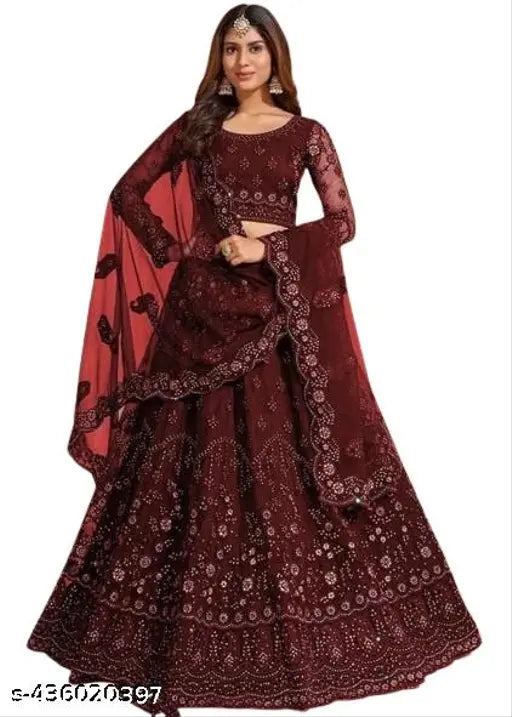 Embroidered net lehenga set with choli and dupatta, intricately designed Indian bridal wear