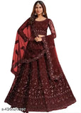 Embroidered net lehenga set with choli and dupatta, intricately designed Indian bridal wear