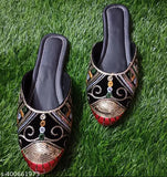 Patent leather colorblocked shoes, stylish Rajwadi Bantu footwear on display
