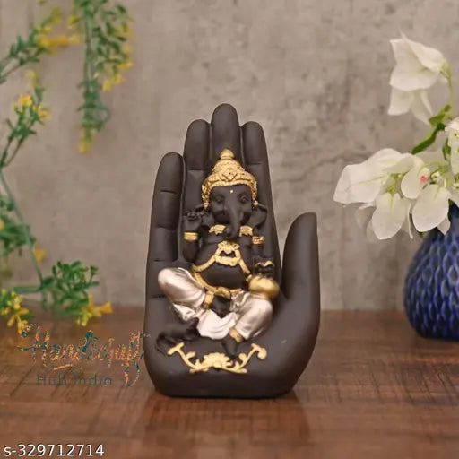 Hand-carved, poly resin Ganesh idol decorative showpiece for Feng Shui or Vastu, size 10x10x15cm. Religious figurine for home or office decor