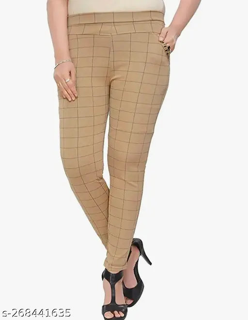 White and brown Lycra checked jeggings combo for women with advanced double pockets, showcasing versatile styling and stretchable comfort. Sizes available include 24 (Waist 24in, Length 47in), 26, 28, 30, 32 (Waist 32in, Length 47in). Indian origin