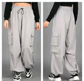Grey polyester dyed/washed cargo pants by MA Fashion - women's casual wear on display