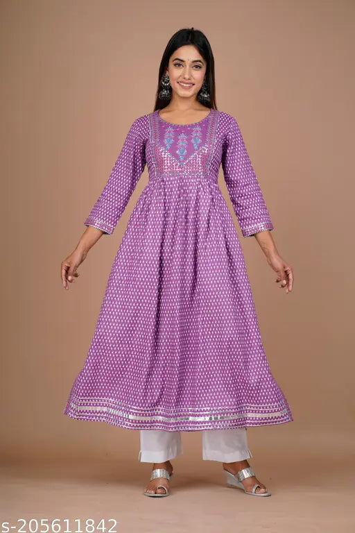 Purple embroidered viscose rayon kurta, three-quarter sleeves, side slit design. Women's Indian fashion wear on mannequin