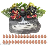 Resin Laxmi Ganesh Smoke Fountain Murti for home office, features 30 back flow incense cones. Handcrafted Indian art piece with a smokey waterfall effect