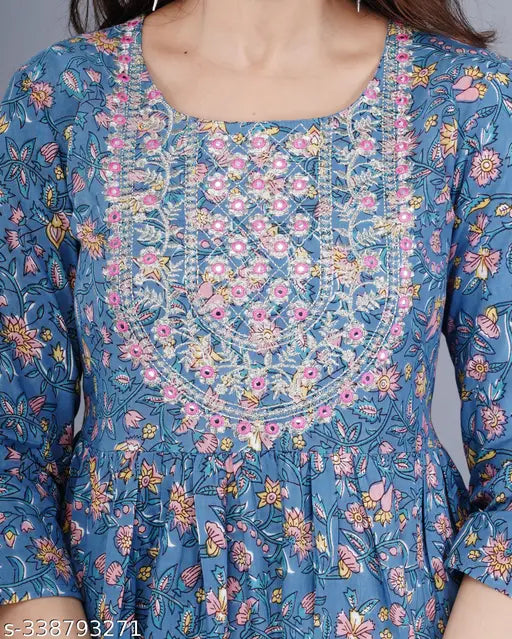 Rayon printed embroidered flared kurta, three-quarter sleeves, vibrant Indian women's fashion
