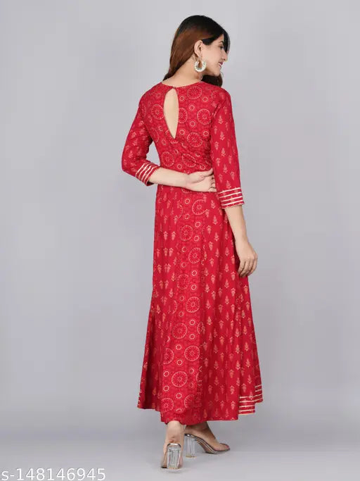 Gold rayon Anarkali kurta with three-quarter sleeves and printed combo, ideal for festive wear, made in India