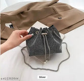 Synthetic rhinestone mini bucket bag, pearl pendant, adjustable drawstring strap, soft shiny material, multipurpose evening clutch for parties, weddings, and events. Indian origin