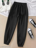 Black polycotton women's joggers for winters, elastic waistband with deep pockets - ideal for sports, gym, or running. Indian-made." (104 characters)